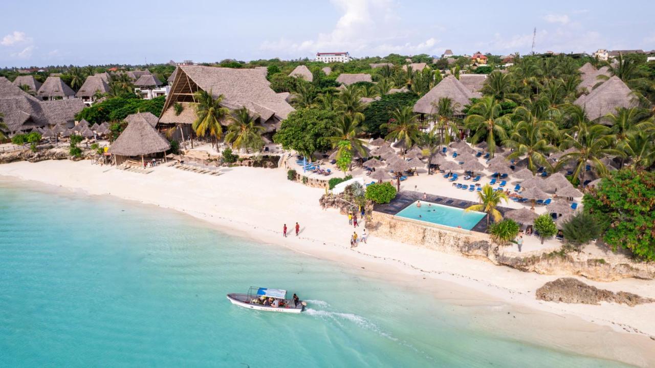 Aerial view of Nungwi Beach with white sand and the turquoise Indian Ocean at My Blue Hotel